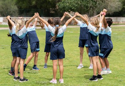 Ethos children playing hand in hand