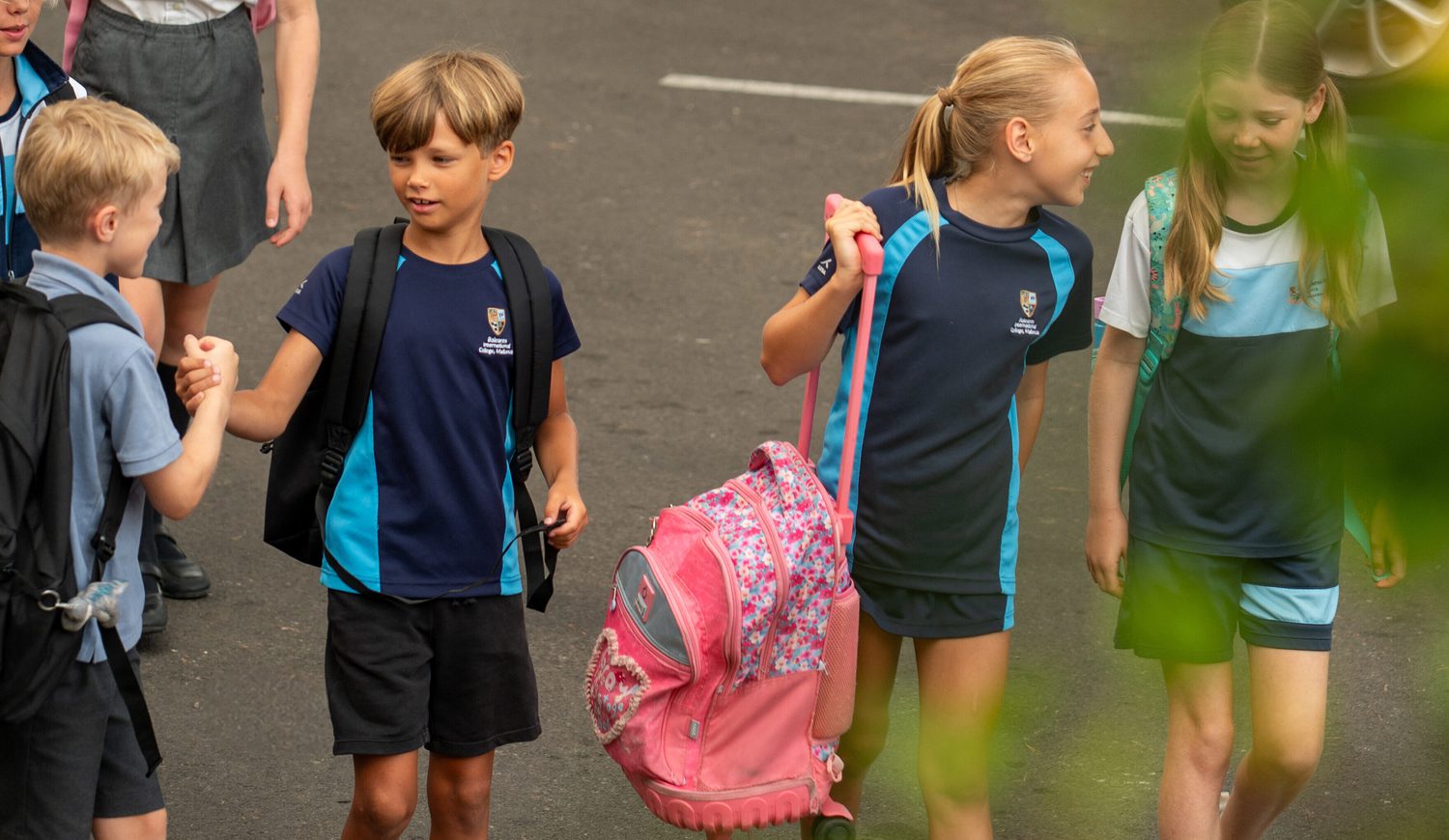 Children walking outside the school.