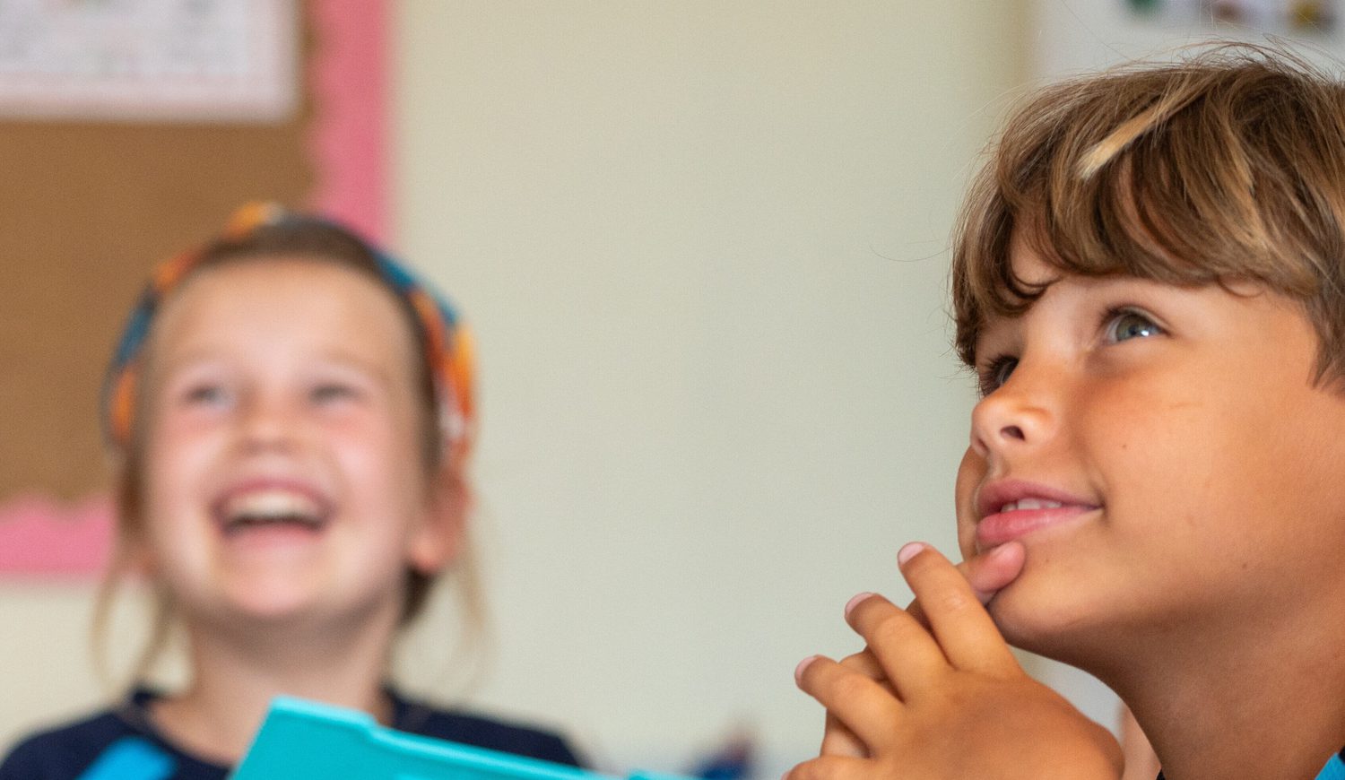 Children laughing and having fun while learning.