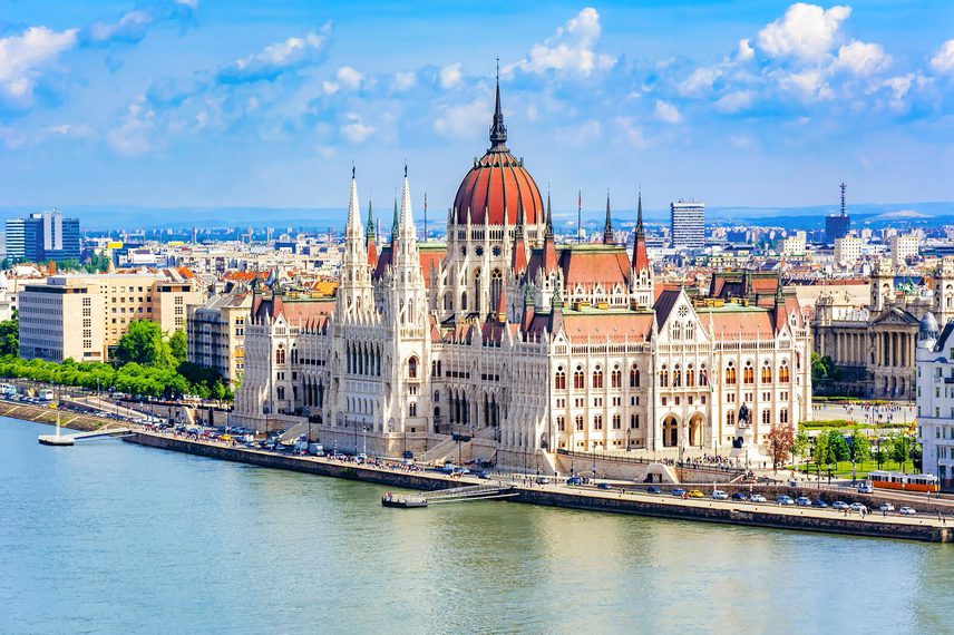 Budapest city skyline in daytime with river in foreground
